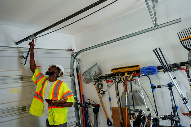 Professional Garage Door Roller Replacement technician working in Roanoke, AL